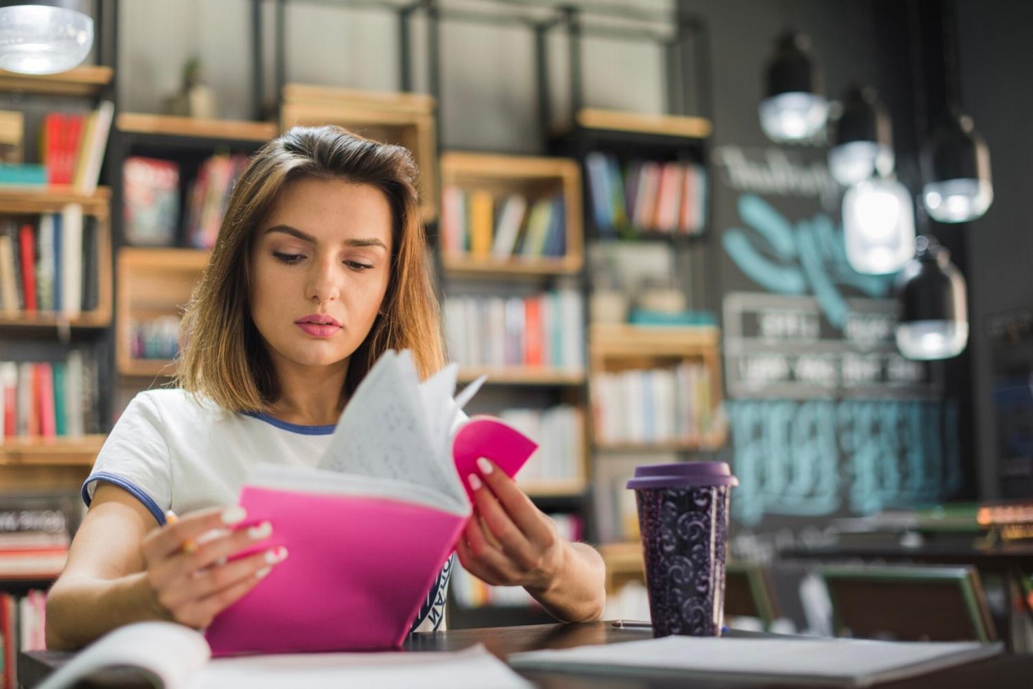 Family reviewing flexible budget categories on laptop with coffee